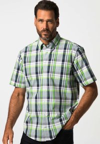 Korte mouwen geruite blouse met groene, zwarte en grijze kleuren, met button-down kraag en borstzak. Lichtgewicht stof met een ruitpatroon.