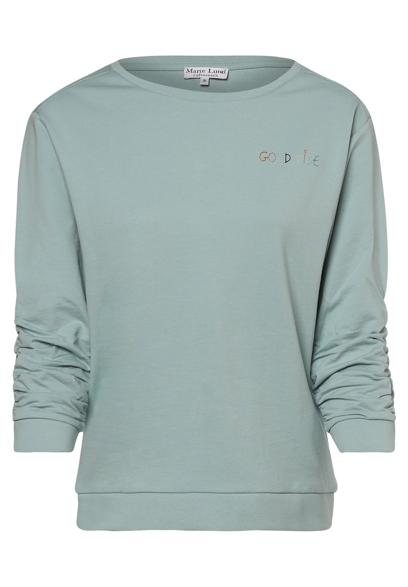 Kardigan z długim rękawem w jasnym zielonym kolorze, z okrągłym dekoltem i marszczonymi rękawami. Posiada haftowany napis "DOBRE WIBRACJE" w kolorowej stylistyce.