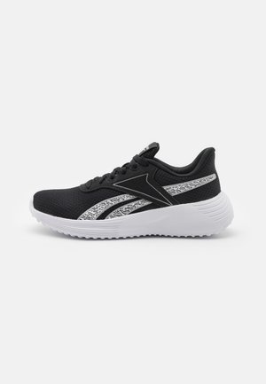 Black athletic shoes with mesh upper, white sole, unique textured accents on sides, and black laces. Lightweight design for comfort.