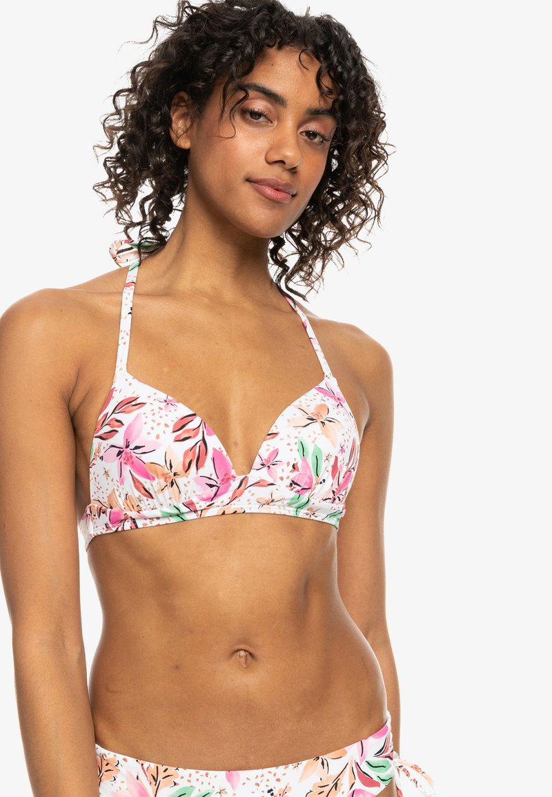 Bloemige bikinitop in roze en groene tinten met een V-hals, halterbandjes en een textuurstof met een levendig botanisch patroon.