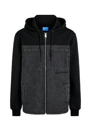 Kapuca jakna z črnim bombažnim zgornjim delom, spredaj iz sivega denima, z dvema velikima sprednjima žepoma in zadrgo s podrobnostjo logotipa.