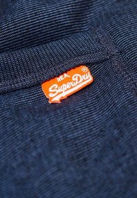 Superdry & Co Spodnie treningowe