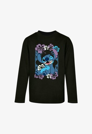 Langærmet sort T-shirt med en blå tegneseriefigur omgivet af lilla og blå blomster i et legende design.