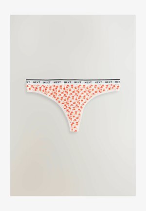 Perizoma bianco con piccola stampa floreale rossa. Presenta una vita nera con il marchio "NEXT" ripetuto. Texture liscia e design minimalista.