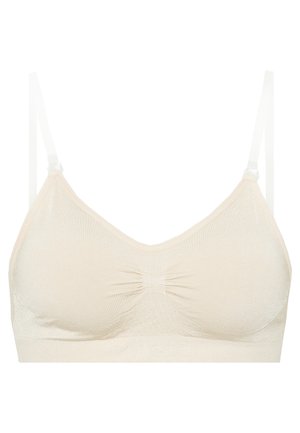 Bralette beige, sans coutures, avec un décolleté en V, un détail central froncé et des bretelles réglables. Tissu doux et extensible avec une texture lisse.