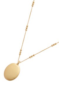 Gold necklace with a smooth oval pendant and a delicate chain accented by evenly spaced small gold beads.