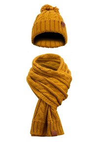 Mustard yellow knit hat with a pom-pom, paired with a matching scarf featuring a textured cable pattern and ribbed edges.