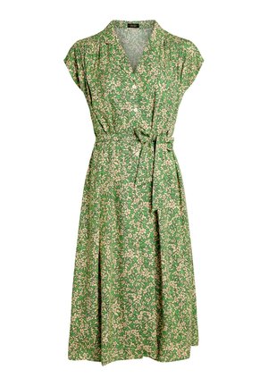 Green wrap dress with a floral pattern in beige. Short sleeves, v-neckline, and a tied waist. Flowy fabric with a knee-length hem.