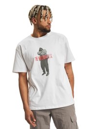 Hvid bomulds T-shirt med et stort grafisk tryk af en figur i grå med teksten "THE NOTORIOUS B.I.G." i rød. Løs pasform.
