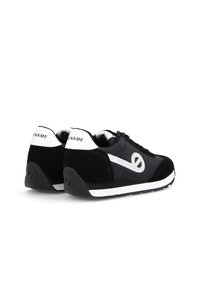 Black and silver athletic shoes with a lace-up front, suede and textile materials, round toe, and a contrasting white sole.