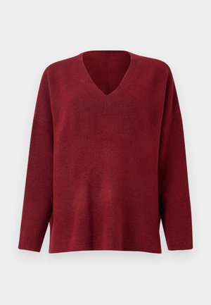 Rode v-hals pullover trui met lange mouwen, gemaakt van zachte, gestructureerde stof, met een losse pasvorm en zijsplitten aan de zoom.