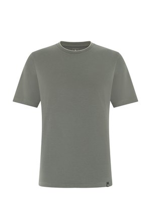 T-shirt unisexe à manches courtes et col rond en vert olive doux avec une petite étiquette de marque noire sur l'ourlet inférieur.