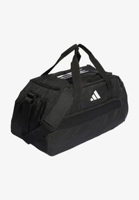 Musthave mustrite duffel kott, mis on valmistatud vastupidavast kangast. Omab kahte käepidet, reguleeritavat rihma, eesmist võrgutaskut ja kolme valget triipu logo.