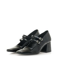 Des escarpins en cuir verni noir avec un bout carré, des brides à double boucle autour de la cheville et un design à talon block. Texture lisse, finition brillante.