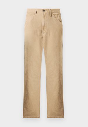 Beige cotton trousers with straight leg design, front pockets, and a button-fly closure. Smooth texture, minimal stitching detail.
