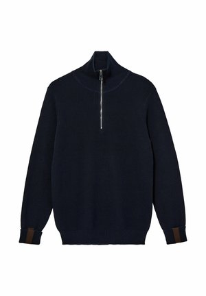 Tumši zils adīts džemperis ar augstu apkakli, kuram ir ceturtā zīips un kontrastējoši brūni svītru akcenti uz piedurknēm. Mīksta tekstūra.