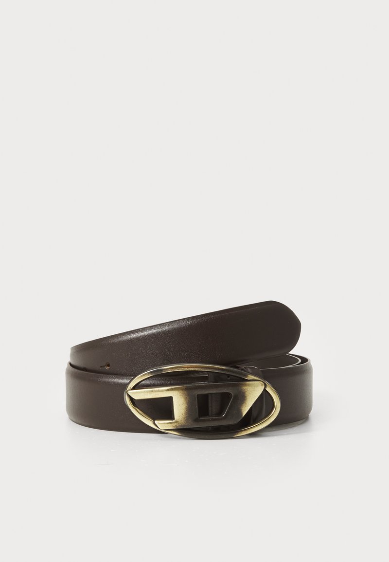 Brown leather belt featuring a large, oval brass buckle with a cutout design. Smooth texture with polished finish.