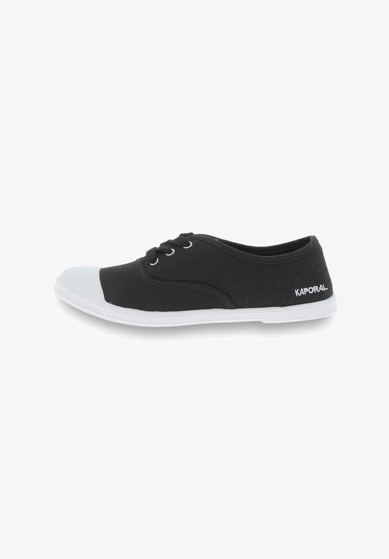 Black canvas sneaker featuring a white rubber toe cap and sole, with metal eyelets and a branded heel detail. Smooth texture throughout.