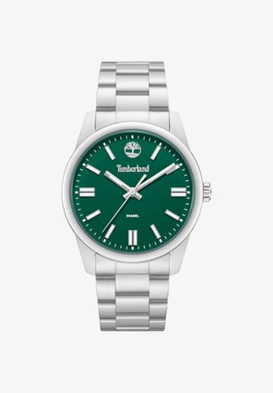 Montre-bracelet en métal argenté avec cadran vert, index argentés, logo Timberland, et trois aiguilles indiquant 10:08:37.
