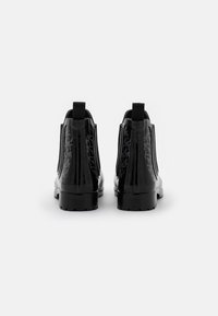 MICHAEL Michael Kors Botas de agua - black