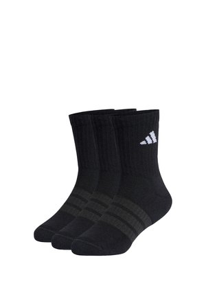Drei Paar schwarze Knöchelsocken mit dunkelgrauen Streifen und einem weißen Markenlogo am Bündchen, nebeneinander auf einem weißen Hintergrund dargestellt.