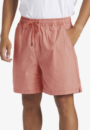 Men's coral drawstring shorts made of lightweight fabric, featuring side pockets, elastic waistband, and a relaxed fit with a hemline above the knee.