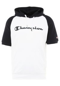 Czarna i biała bluza z krótkim rękawem z kieszenią na przodzie oraz logo "Champion" na piersi i małym logo na lewym rękawie.