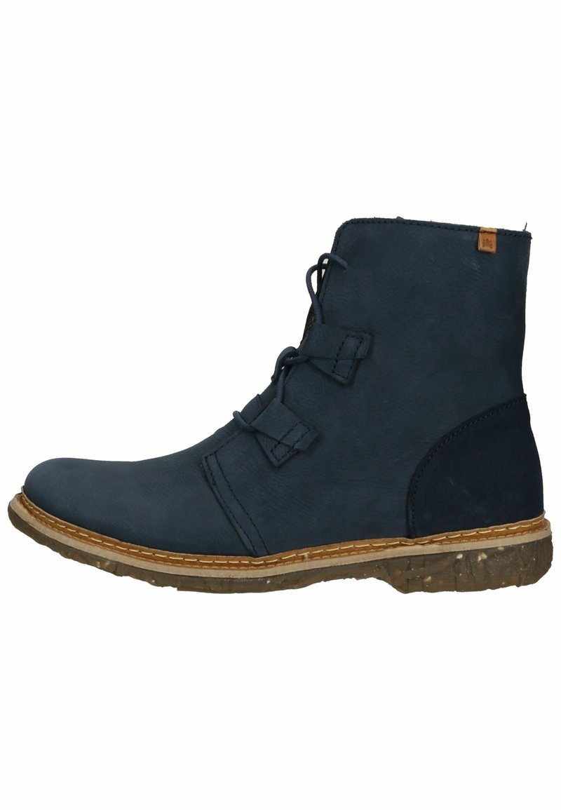 Navy blue leather ankle boot with a rounded toe, lace-up front, and two decorative straps; textured rubber sole with a contrasting light brown trim.