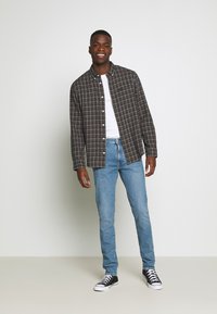 Levi's® 512® SLIM TAPER - Calças de ganga justas - amalfi pool