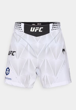 Valged MMA lühikesed püksid, millel on tekstuuriga lehemuster, must vöökoht "UFC" logoga ja disainielemendid külgedel.