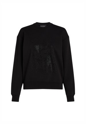 Hanorac negru cu un design grafic texturat, având accente strălucitoare în centrul acestuia. Sleevuri lungi și manșete zimțate completează aspectul.