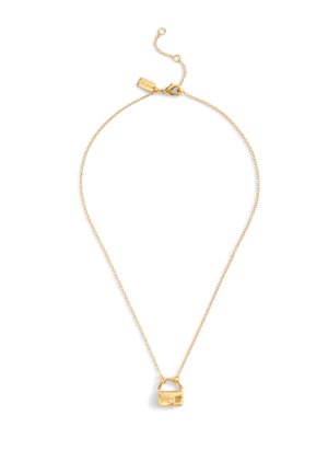 Gold necklace featuring a small handbag pendant. The chain is delicate with a simple lobster clasp and an adjustable extension.