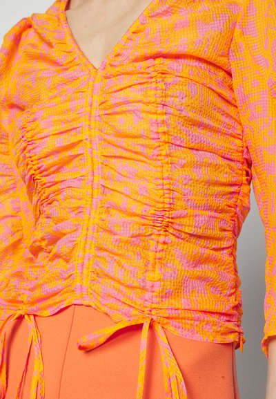 Rodebjer T-shirt à manches longues - orange haze