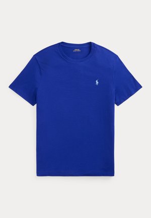 Blå T-skjorte med korte ermer og rund hals, med lite lyseblått brodert Polo Ralph Lauren-logo på venstre bryst.