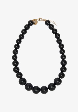 Czarny naszyjnik z okrągłych, stopniowanych koralików z złotym zapięciem typu karabińczyk i łańcuszkiem przedłużającym.