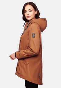 Brown waterproof jacket with a hood, features a black logo patch on the sleeve, drawstring accents, and snap button closures.