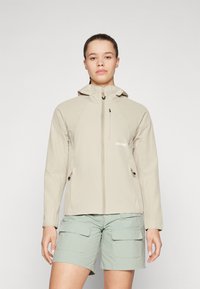 Veste zippée beige clair avec capuche, dotée de poches avant, d'une finition texturée et de cordons ajustables aux poignets et à l'ourlet.