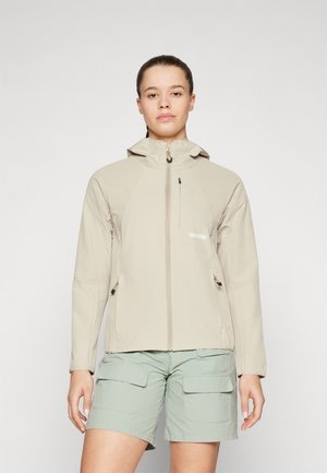 Veste zippée beige clair avec capuche, dotée de poches avant, d'une finition texturée et de cordons ajustables aux poignets et à l'ourlet.