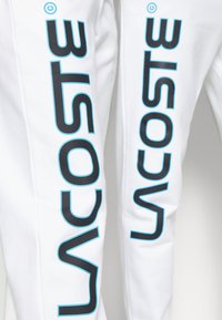 Lacoste Träningsbyxor - white