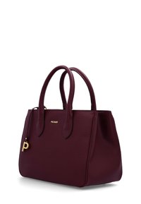 Dark burgundy textured leather handbag with double handles, gold "Picard" logo, and a hanging gold "P" charm on a white background.