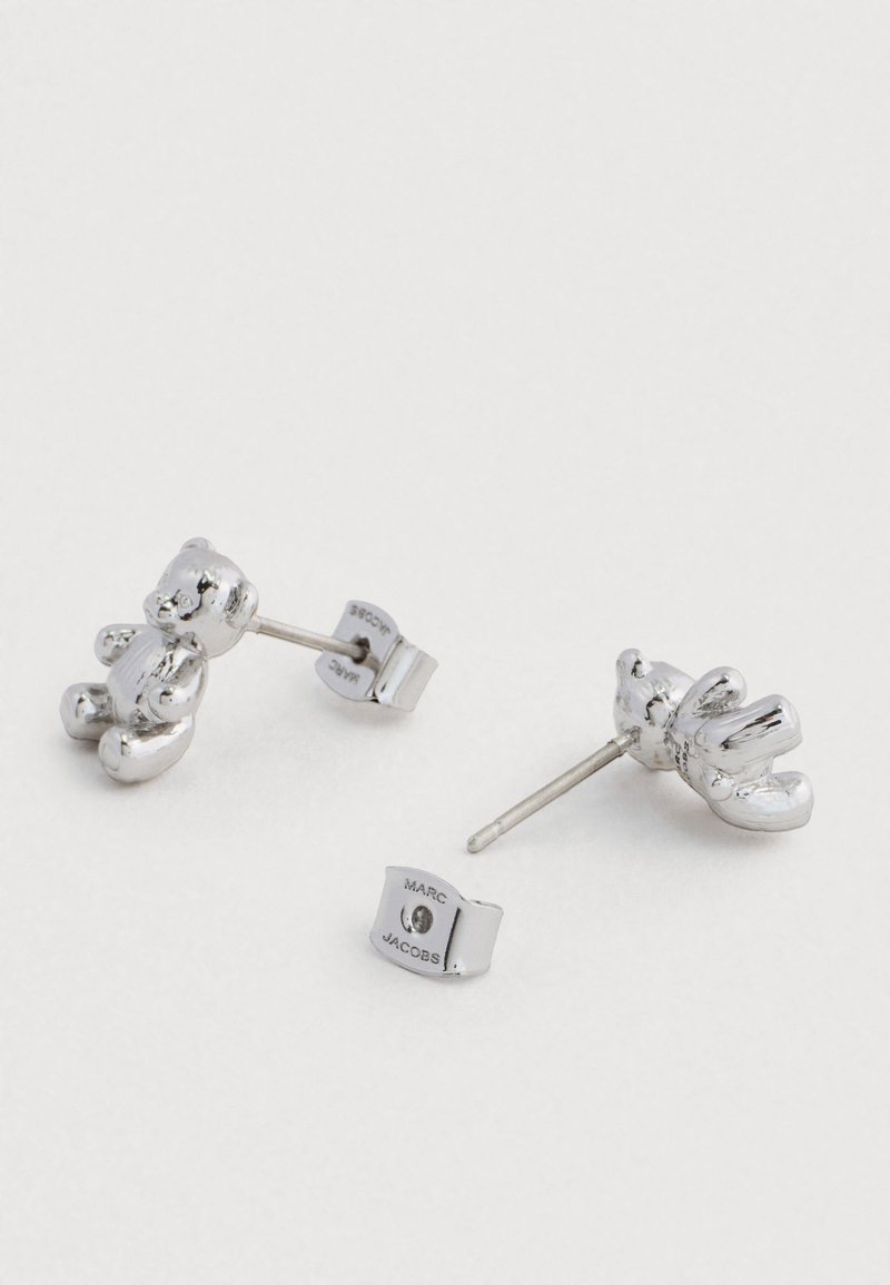 Orecchini pendenti in argento sterling con simbolo della pace e nodo