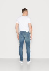 Replay ANBASS  - Vaqueros slim fit - medium blue
