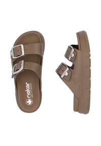 Brown sandals made of soft material, featuring two adjustable silver buckles, a cushioned footbed, and a textured rubber sole.