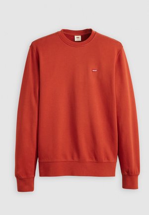 Röd sweatshirt i mjukt tyg, med rundad halsringning och långa ärmar. Liten logotags vid vänster bröst.