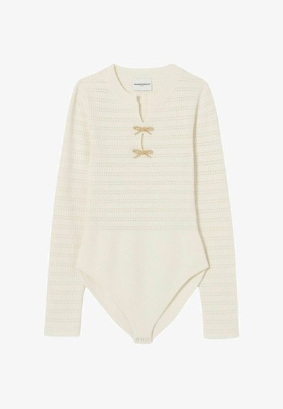 Bodysuit de manga larga en color crema, con un patrón de punto texturizado, escote redondo y dos lazos decorativos dorados en la abertura.
