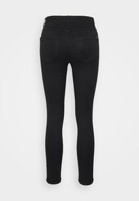 Zwarte skinny jeans met een hoge taille, gestructureerde achterzakken en een gladde, rekbare denim stof.