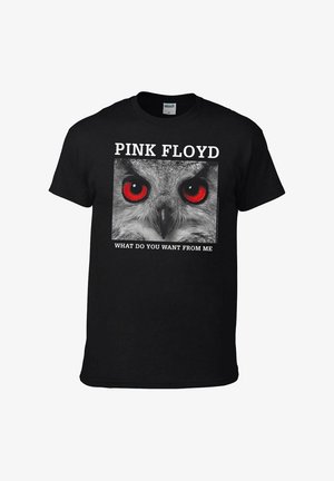 Černé bavlněné tričko s grafikou sovy s červenýma očima, orámované textem "PINK FLOYD" nahoře a "CO OD MĚ CHCETE?" níže.