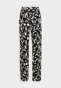 Black and white patterned trousers with a loose fit, featuring an elastic waistband and a soft fabric texture.
