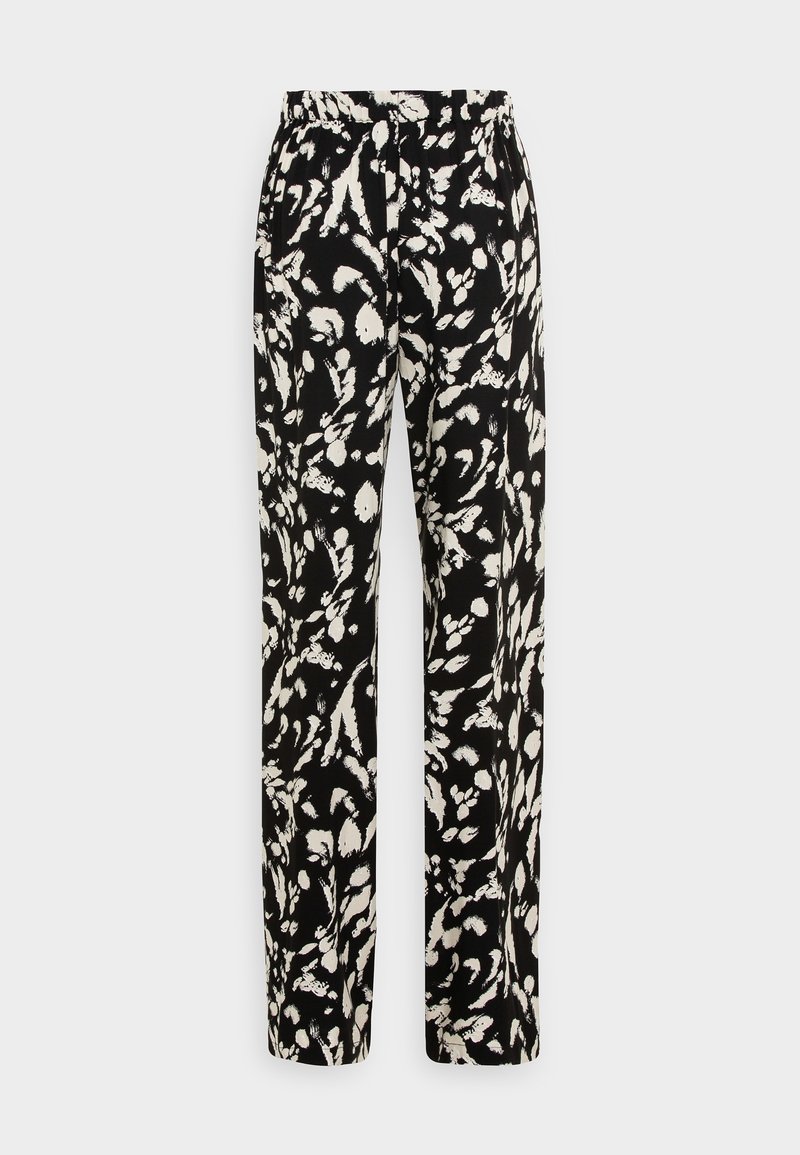 Black and white patterned trousers with a loose fit, featuring an elastic waistband and a soft fabric texture.