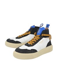 High-top sneakers with a white and black upper, glittery black toe cap, yellow laces, and a textured beige sole. Blue and brown accents.